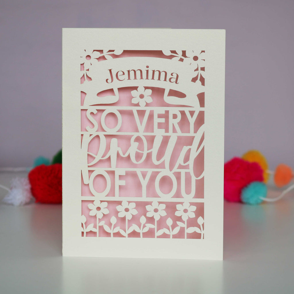 A personalised congrats card that is personalised with a name and reads "So very proud of you"