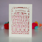 A personalised congrats card that is personalised with a name and reads "So very proud of you"