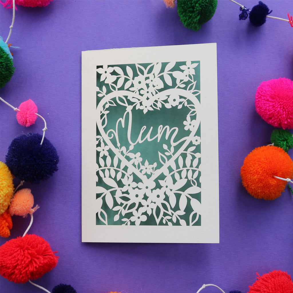 A cut out "Mum" card for Mothering Sunday