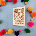 A stop motion video of a laser cut birthday card opening and closing