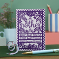 A printed card with purple design and text "A mother is your first friend, your best friend, your forever friend"