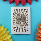 A funny laser cut card that says "My favourite child gave me this card. Happy Father's Day"