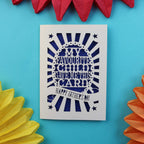 A funny laser cut father's day card that says "My favourite child gave me this card. Happy Father's Day"