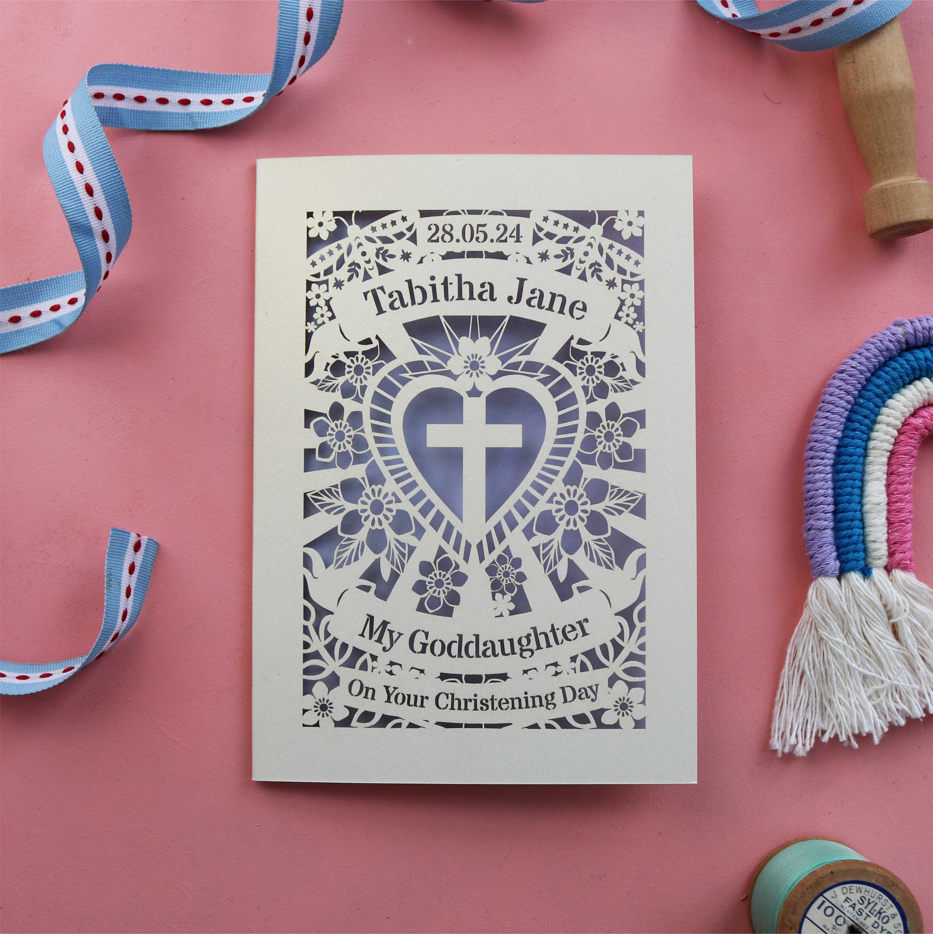 A laser cut Christening card for a Goddaughter, personalised with a name and date