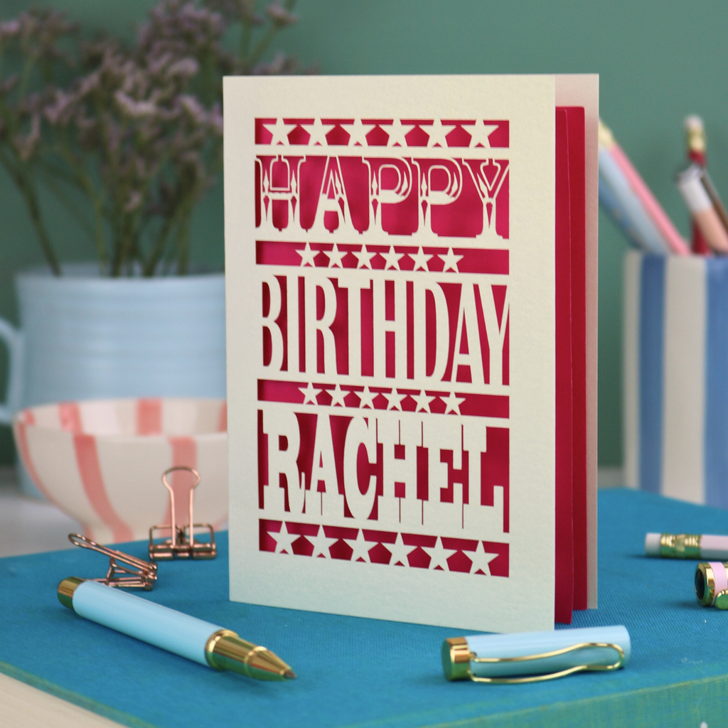 A laser cut personalised birthday card that says "Happy Birthday Steve" in bold text with star design.