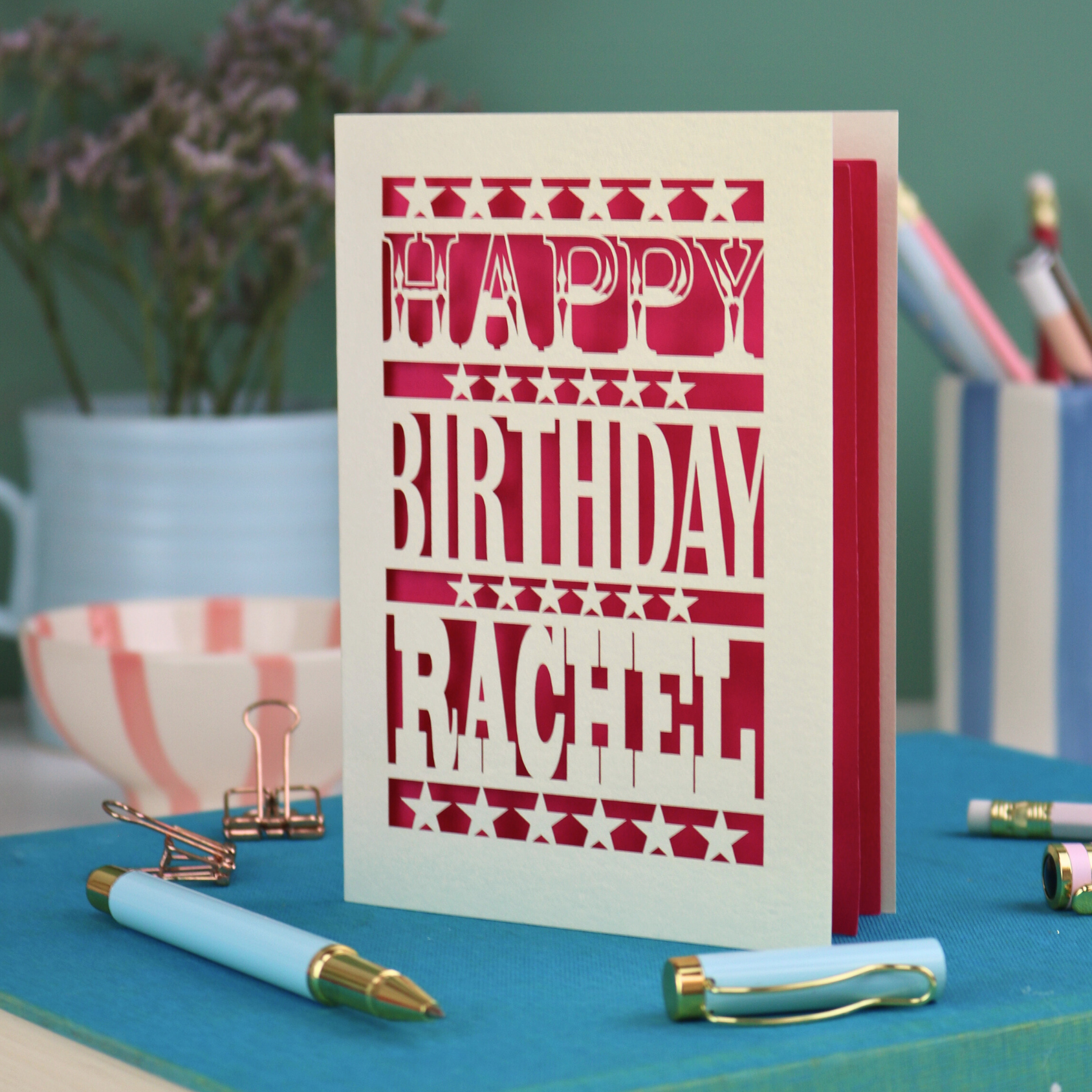 A laser cut personalised birthday card that says "Happy Birthday Steve" in bold text with star design.
