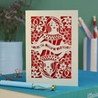 A laser cut Queen of Hearts Mother's Day card with the text "You're the Queen of Our Hearts"