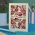 A laser cut Queen of Hearts Mother's Day card with the text "You're the Queen of Our Hearts"