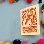 Decorative fox birthday card with fox design and colourful pom-poms on a blue background