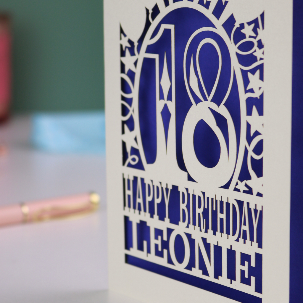 A laser cut 18th birthday card, personalised with a name, and the text "18, Happy Birthday"