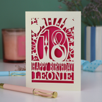 A laser cut 18th birthday card, personalised with a name, and the text "18, Happy Birthday"