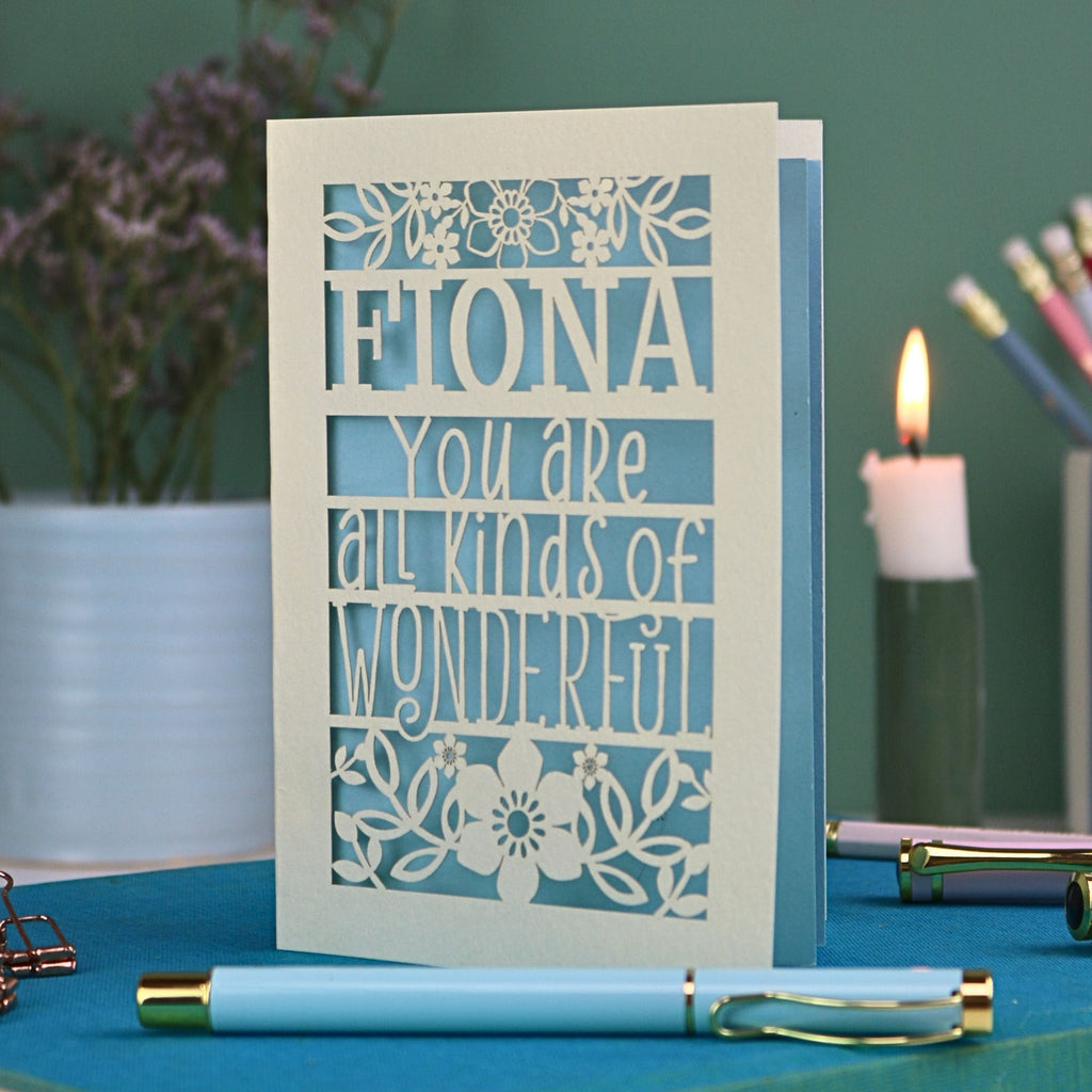 A laser cut greetings card personalised with the name Fiona, and with the text You are all kinds of wonderful