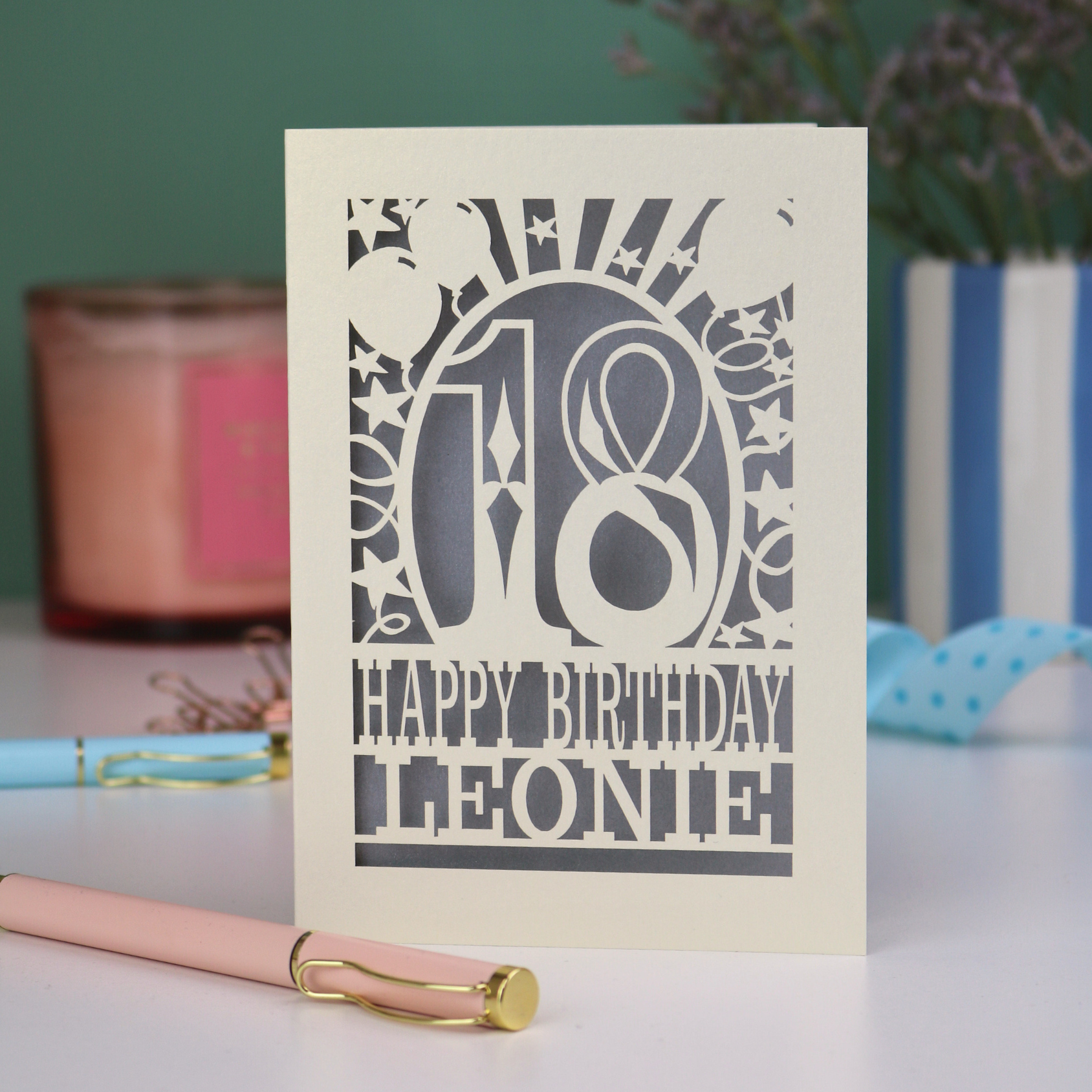 A laser cut 18th birthday card, personalised with a name, and the text "18, Happy Birthday"