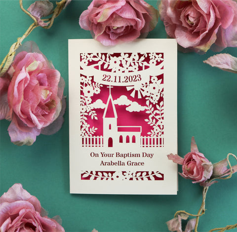 Laser cut Baptism card, personalised with date and a name. Design shows a church surrounded by flowers 