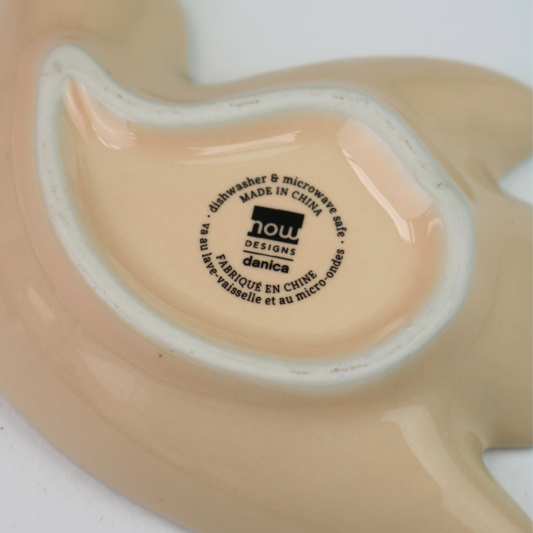 Back of a ceramic product with text on a white background