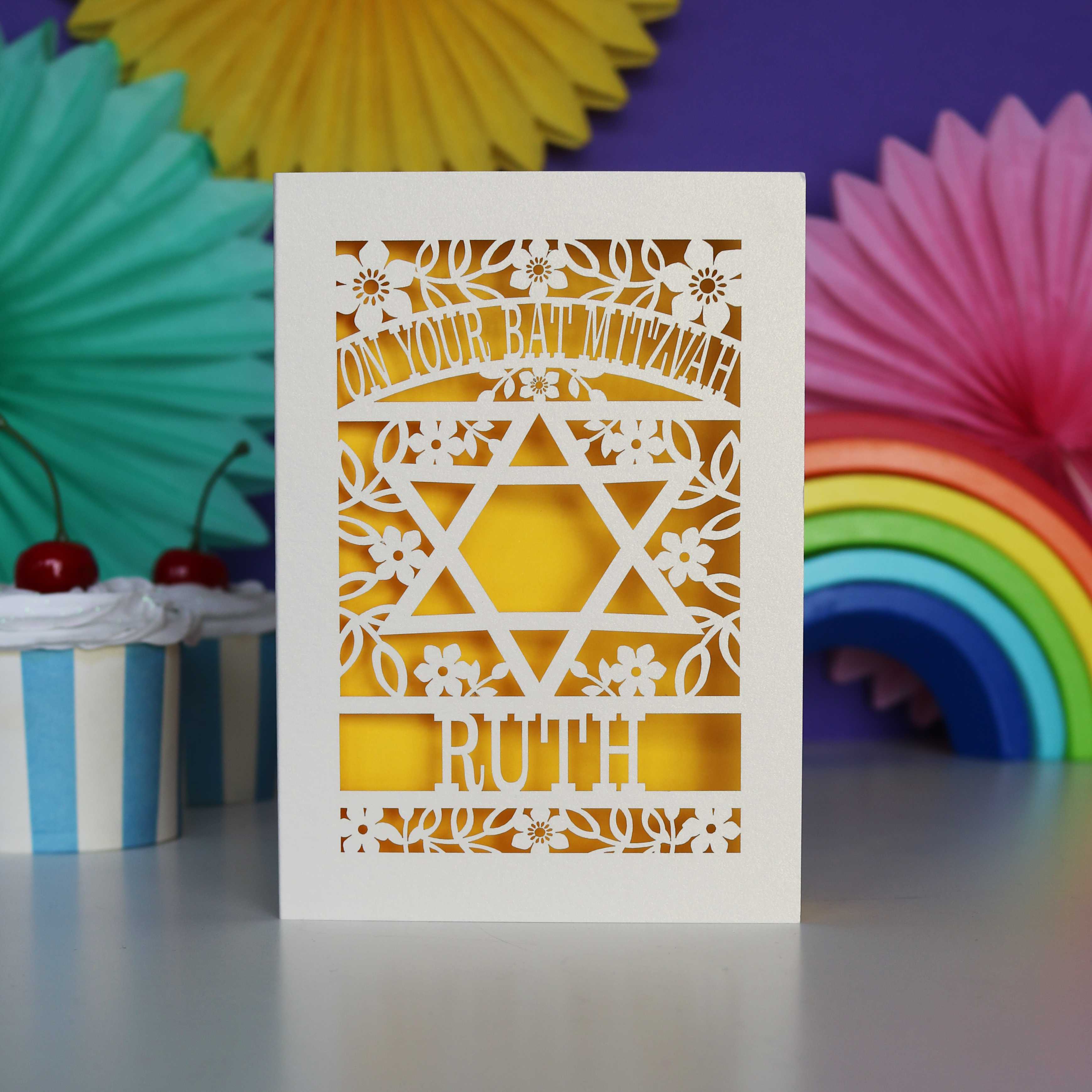 A personalised paper cut Bat Mitzvah card, personalised with the recipient's name