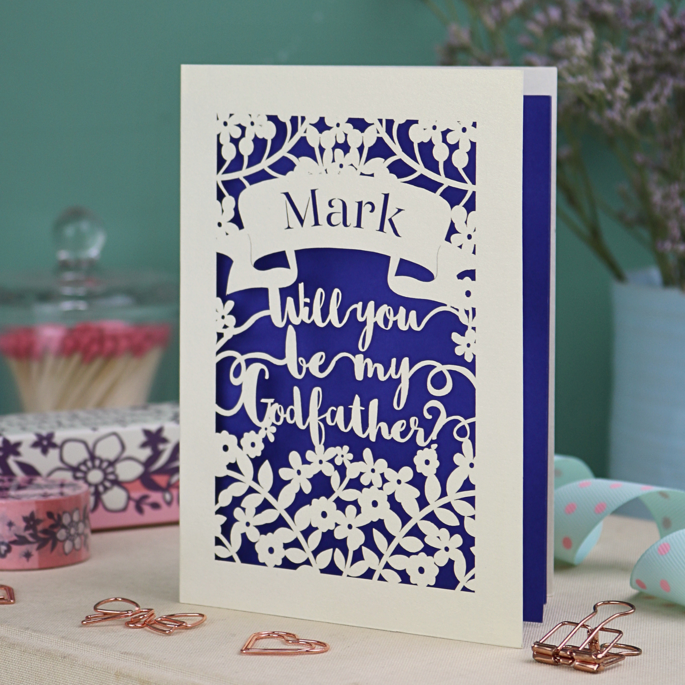 A personalised laser cut Godfather card with 'Will you be my Godfather?' text on a decorative background