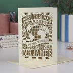 A laser cut cream and gold leaf thank you teacher card with globe design and the text Best Teacher in the World Mr James"