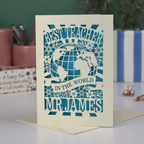 A laser cut cream thank you teacher card with globe design and the text Best Teacher in the World Mr James"