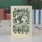 A laser cut cream and sage green thank you teacher card with globe design and the text Best Teacher in the World Mr James"