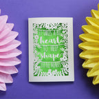 A laser cut teacher card in cream with a green paper insert. 