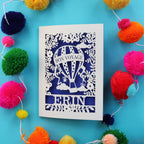 A laser cut bon voyage card with a hot air balloon and personalised with a name