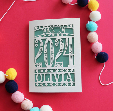 A laser cut baby card that says "Born in 2024" - A6 (small) / Sage