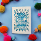 Keepsake Boyfriend Christmas card with 'Merry Christmas to my boyfriend' text on a blue background with colourful pom-poms.