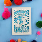 Cut out boyfriend Valentines Card with 'Happy Valentine's Day to the best boyfriend in the world' text on a blue background with colourful pom-poms.