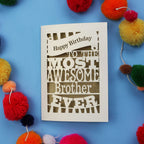 Handmade Birthday card for the most awesome brother ever on a blue background with colourful pom-poms.