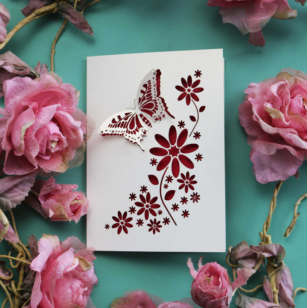 A butterfly card with push of 3D effect wings and flower details