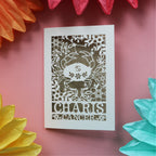 A cut out birthday card personalised with the recipient's name. 