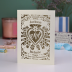 Personalized civil partnership card with decorative text and design on a blurred background