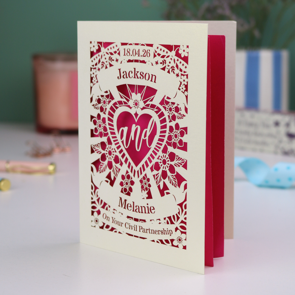 Personalized civil partnership card with decorative text and design on a blurred background