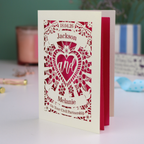 Personalized civil partnership card with decorative text and design on a blurred background