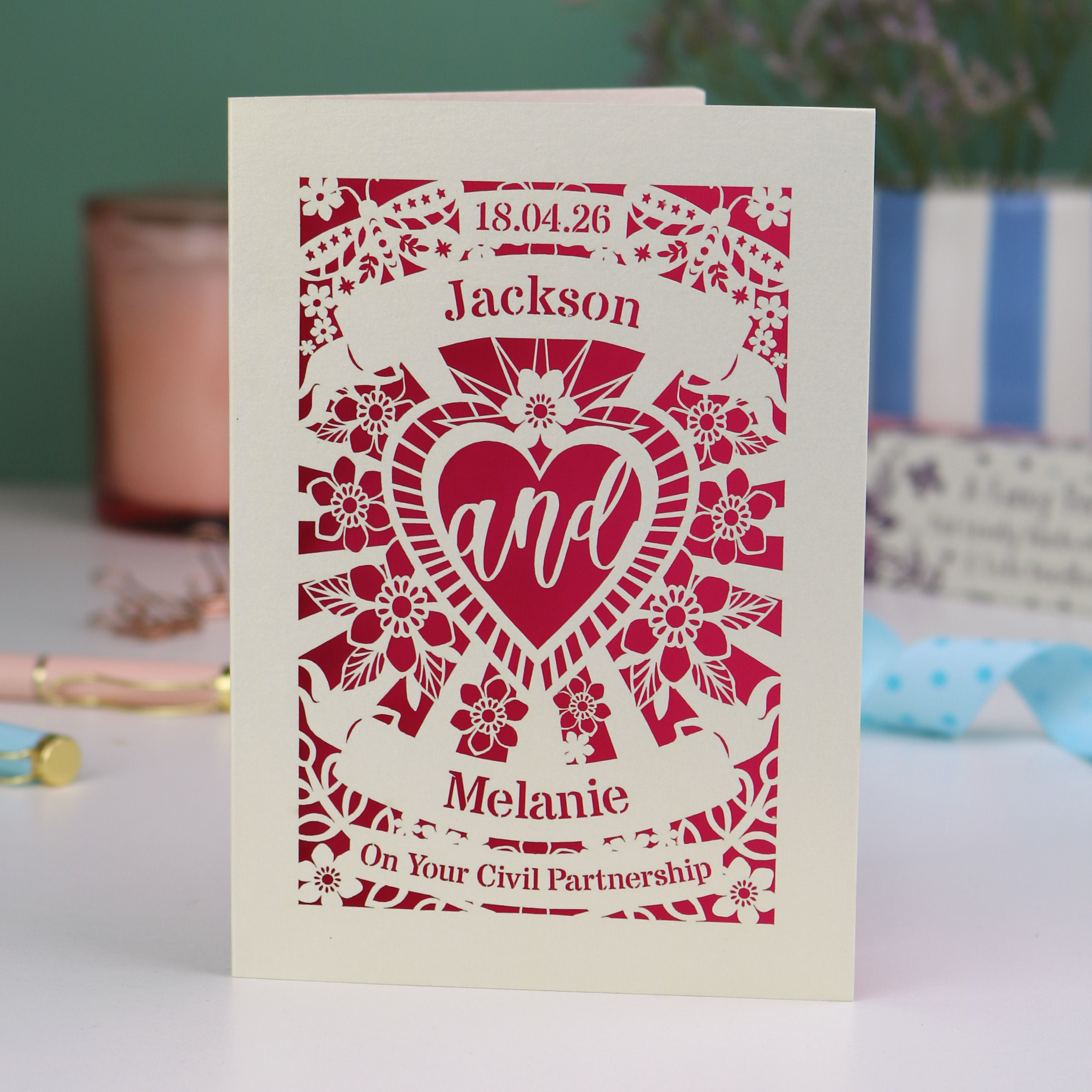 Personalized civil partnership card with decorative text and design on a blurred background