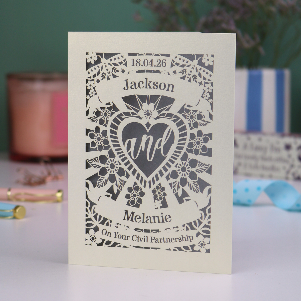 Personalized civil partnership card with decorative text and design on a blurred background