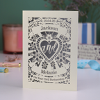 Personalized civil partnership card with decorative text and design on a blurred background