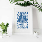 A photo of a framed coffee print for kitchens.