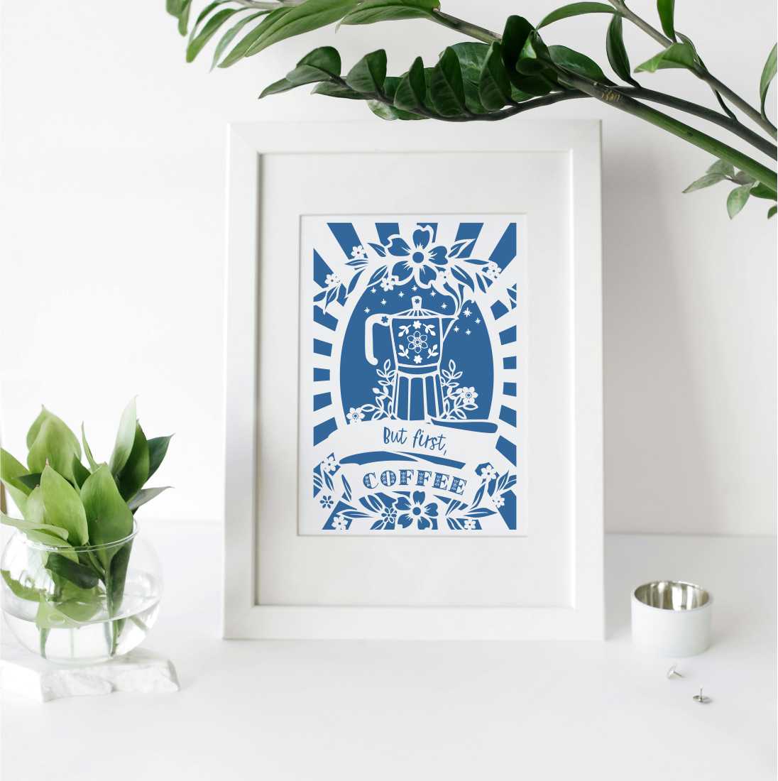 A photo of a framed coffee print for kitchens.