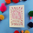 Laser cut funny Valentine's card with coffee-themed design on a blue background with colourful pom-poms.