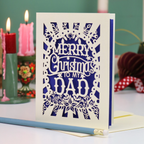 A laser cut Dad Christmas card with festive cut out text, 'Merry Christmas to my Dad'