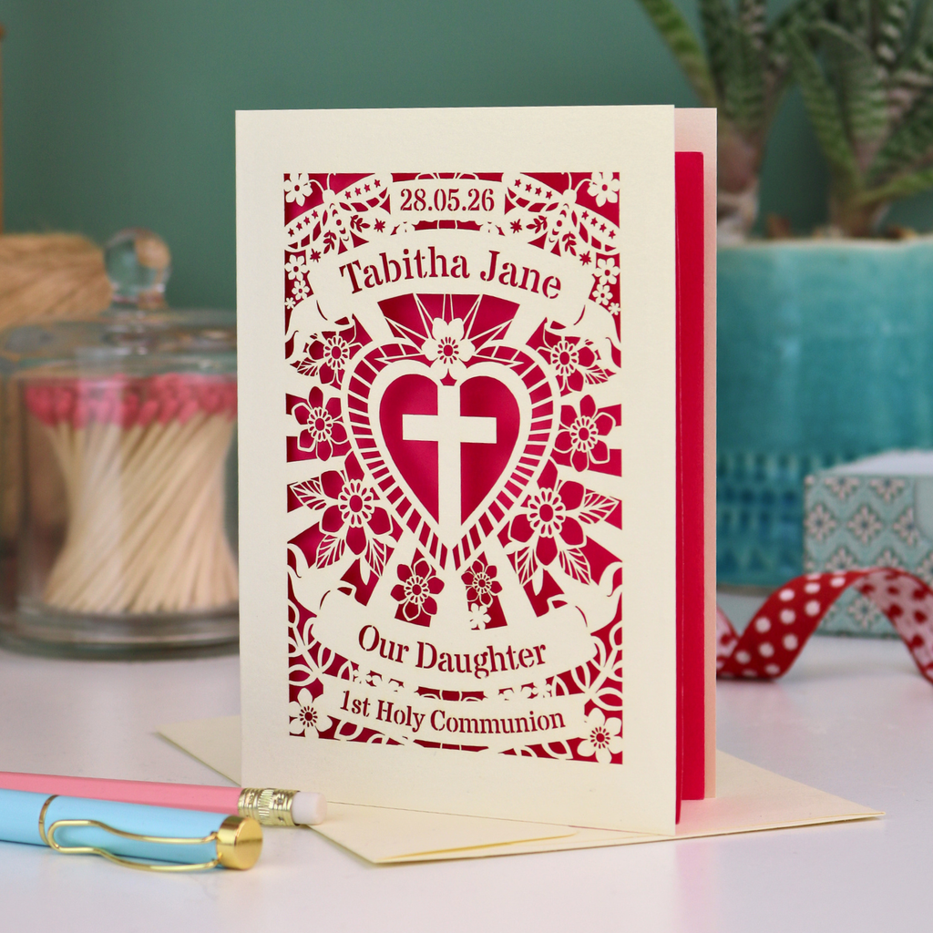 An intricate laser cut Daughter's 1st Holy Communion card personalised with the date and name. 
