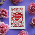 A personalised paper cut card for engagement