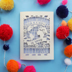 Laser cut adventurere cards that say "The world is yours to explore"