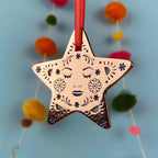 A Decorative star Christmas tree ornament 