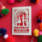 Personalised first Valentine's Card featuring laser cut couple making a heart with their hands, and the words "Our First Valentines Day as Mr & Mrs Davies"