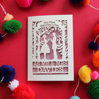 Personalised first Valentine's Day Card featuring laser cut couple making a heart with their hands, and the words "Our First Valentines Day as Mr & Mrs Davies"