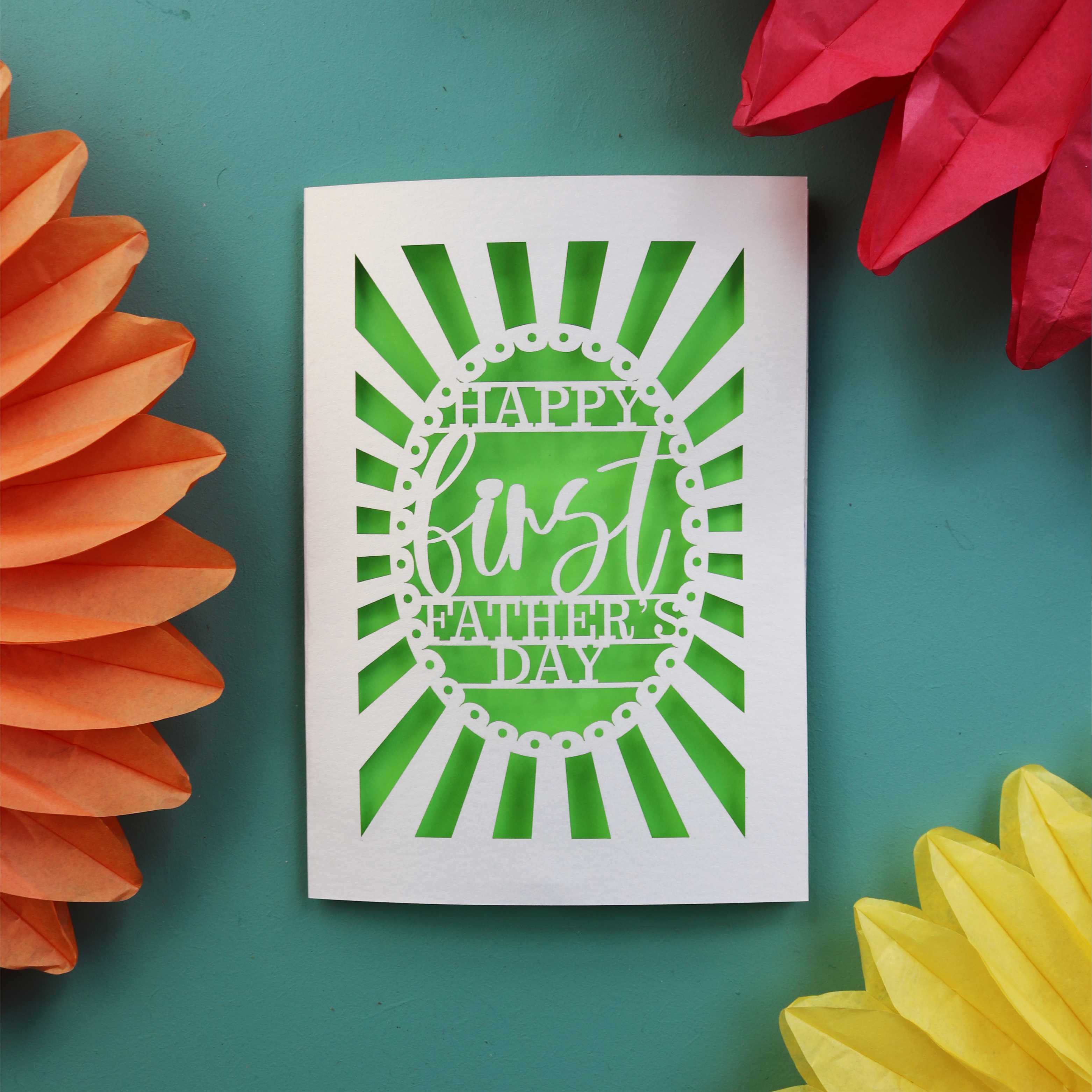 A paper cut "Happy First Fathers Day" card