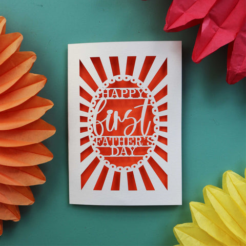 A laser cut card that says "Happy First Father's Day"